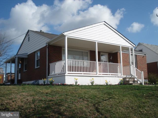 1833 Hanford Road Rosedale, MD 21237 - Photo 9 of 26 a front view of a house with a garden