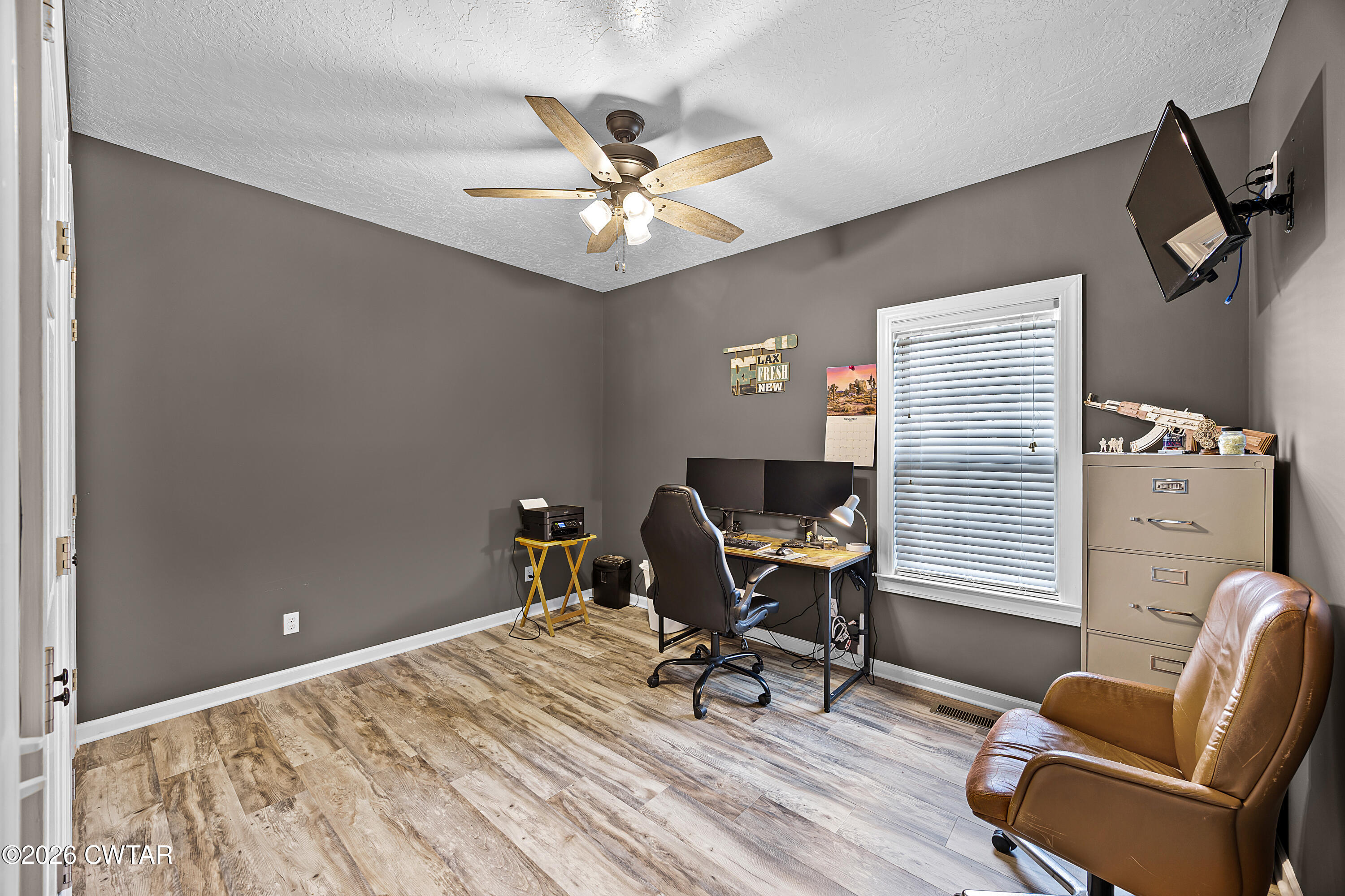 31 Turkey Creek Road Medina, TN 38355 - Photo 17 of 30 a workspace with wooden floor and a window