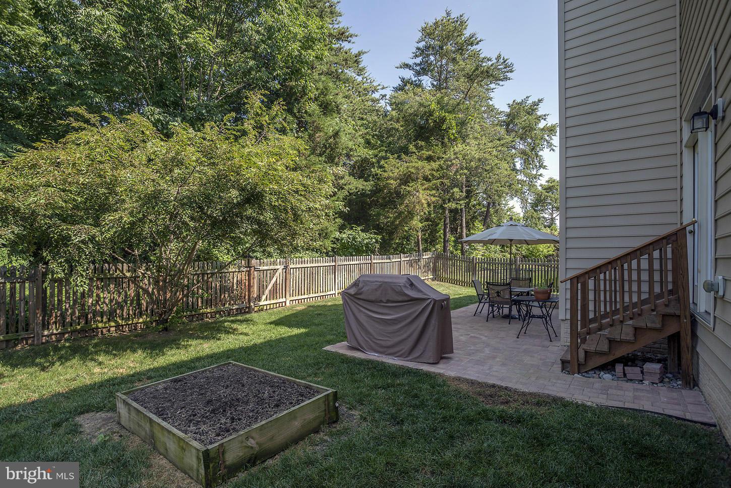8744 Raleigh Mews Gainesville, VA 20155 - Photo 28 of 30 Exterior (Rear)