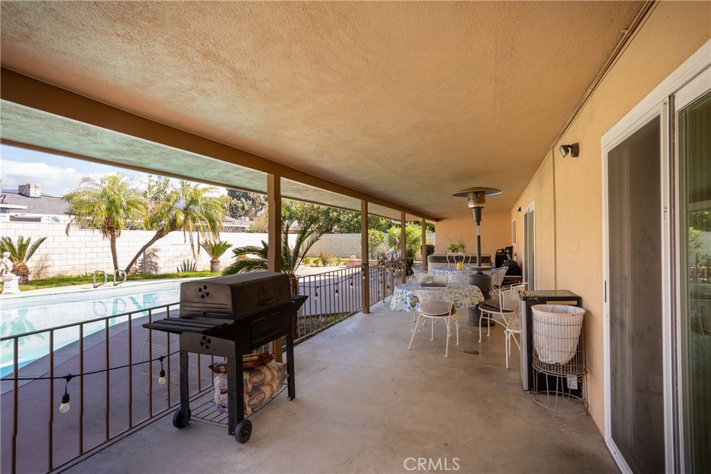 5669 Magnolia Avenue Rialto, CA 92377 - Photo 24 of 35 a living room with furniture and a large window