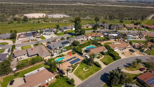 an aerial view of a houses with outdoor space