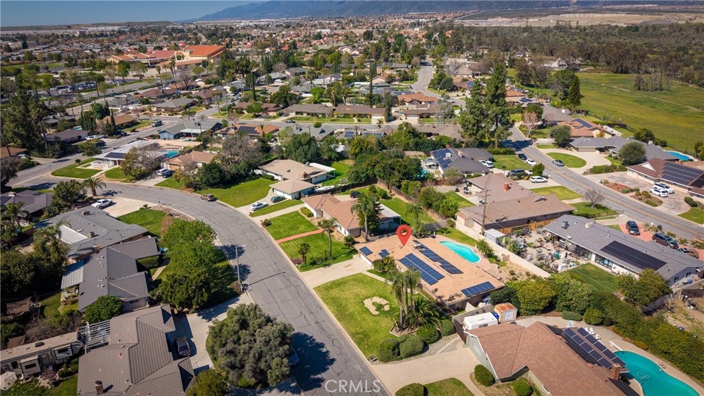 5669 Magnolia Avenue Rialto, CA 92377 - Photo 33 of 35 an aerial view of residential houses with outdoor space