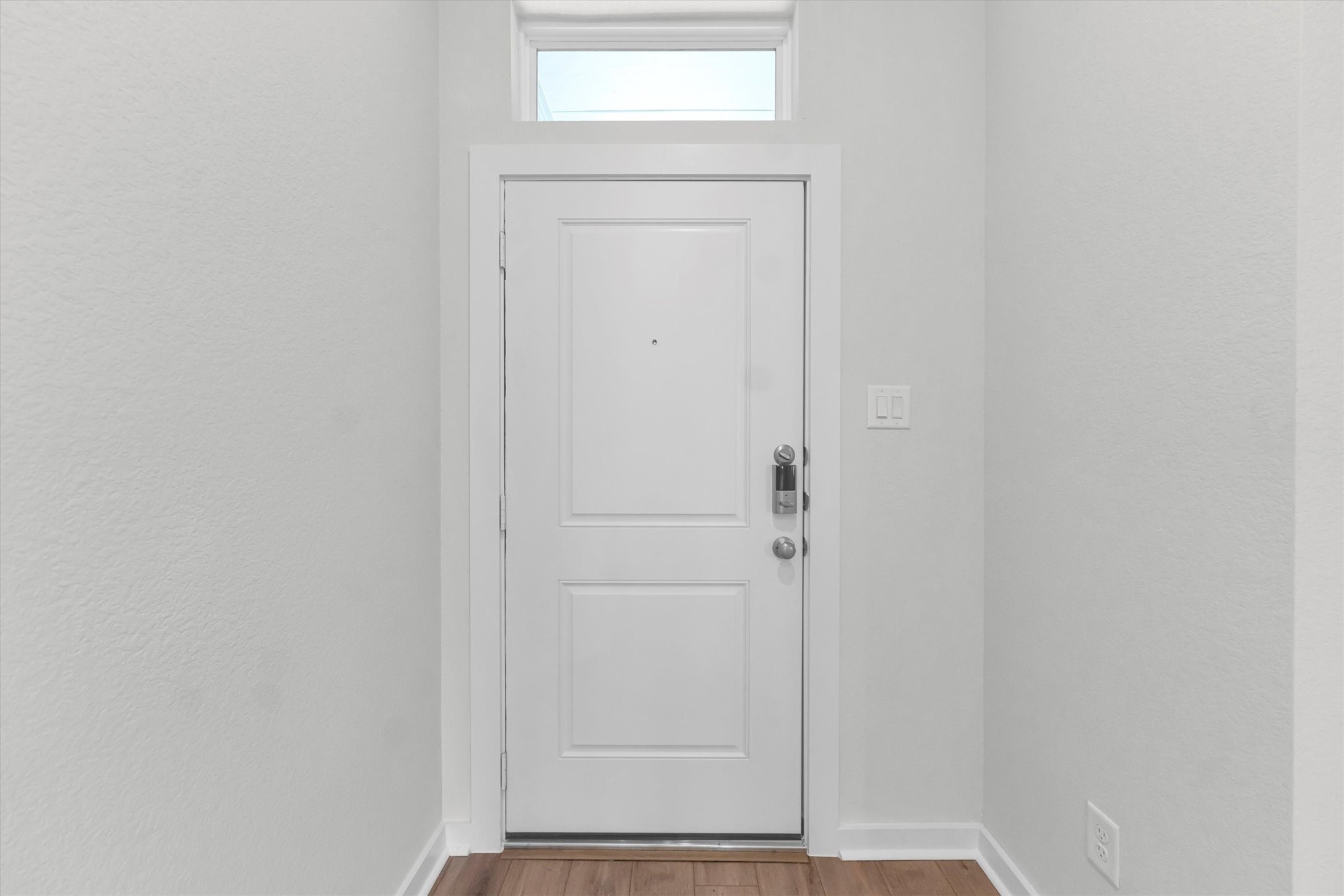 16931 Tulip Row Lane Cypress, TX 77429 - Photo 12 of 48 Solid front door with door viewer for privacy.