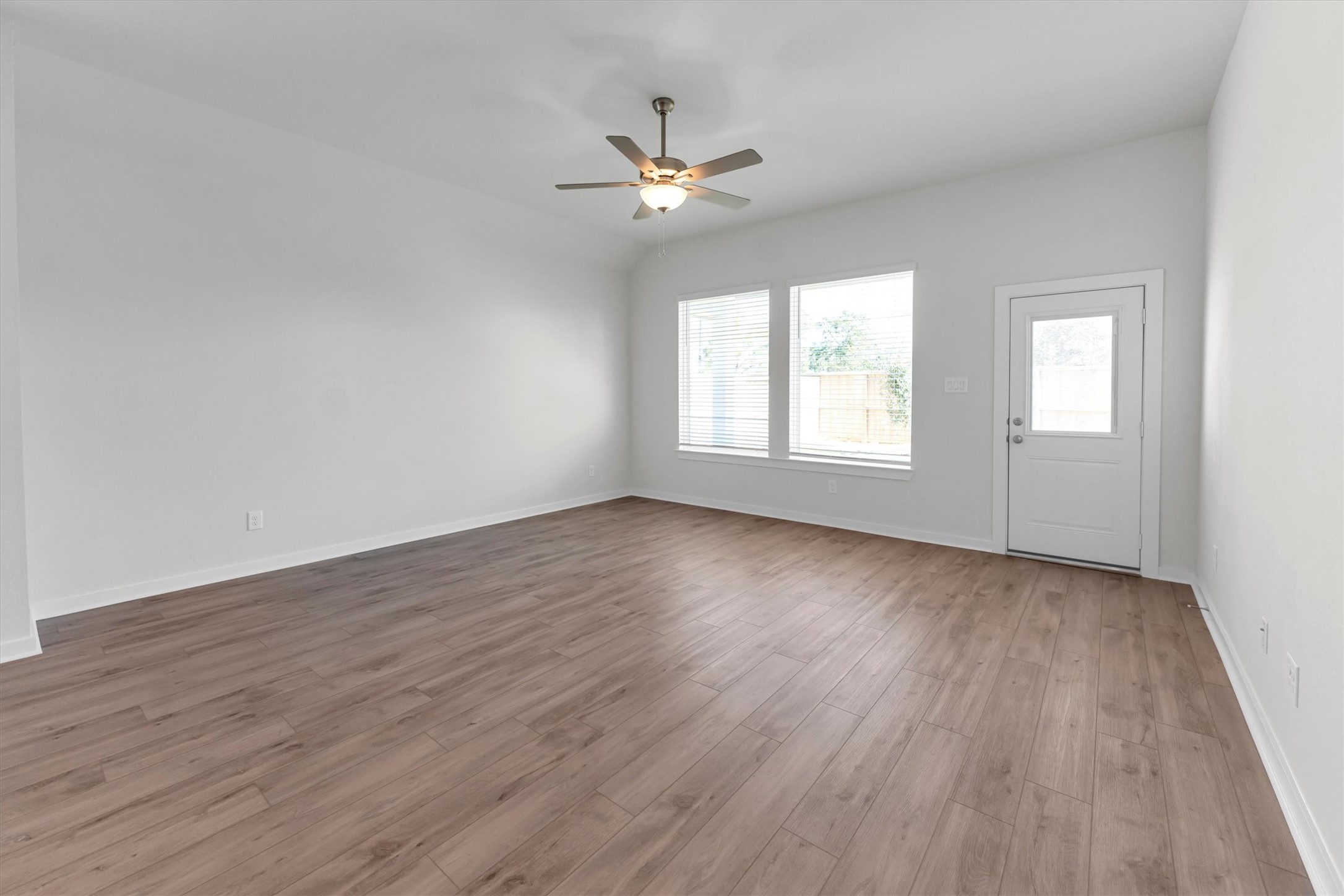 16931 Tulip Row Lane Cypress, TX 77429 - Photo 29 of 48 Family room also features a ton of wall space to make furniture arrangement easy!