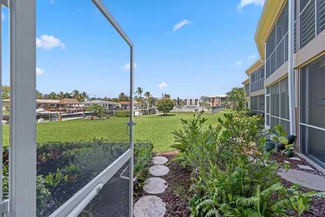 a view of a garden from a balcony