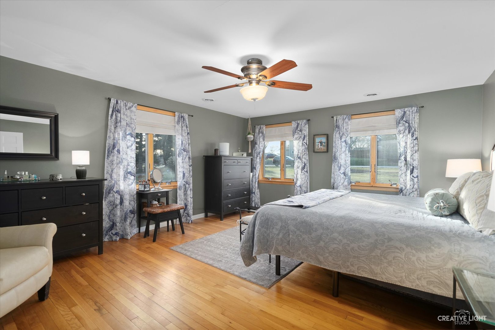 991 Hillcrest Road Elgin, IL 60123 - Photo 14 of 35 a bedroom with a bed and wooden floor
