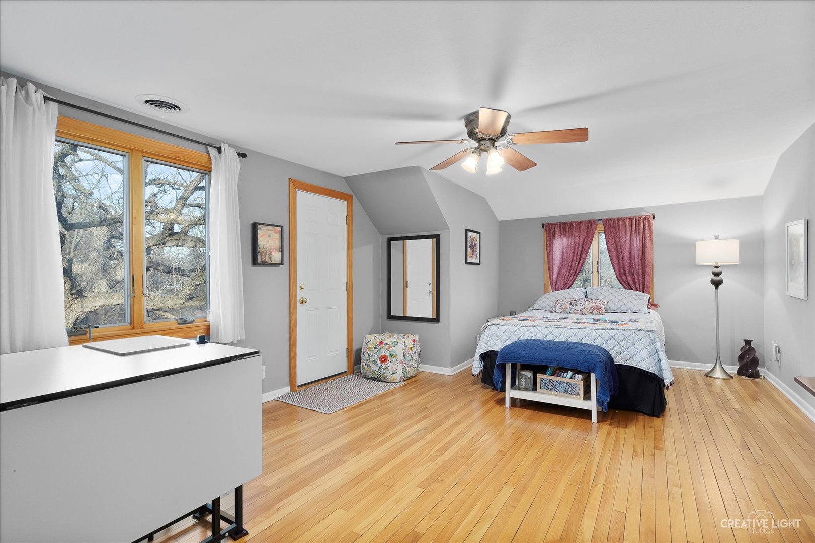 991 Hillcrest Road Elgin, IL 60123 - Photo 19 of 35 a living room with a bed furniture and a large window