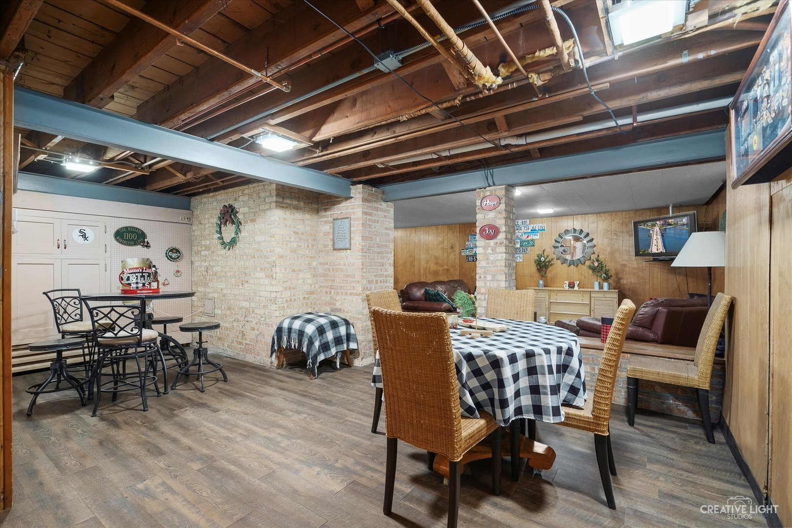 991 Hillcrest Road Elgin, IL 60123 - Photo 21 of 35 a dining room with furniture wooden floor and a chandelier