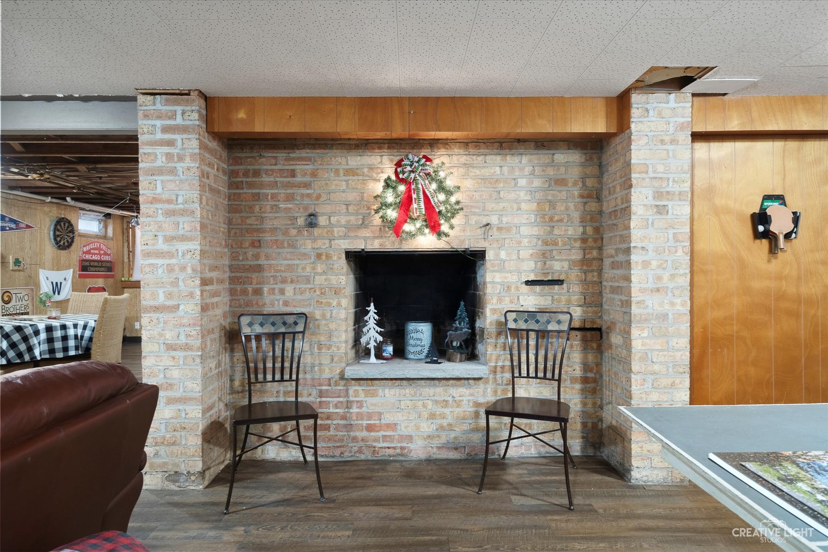 991 Hillcrest Road Elgin, IL 60123 - Photo 25 of 35 a living room with furniture and a fireplace