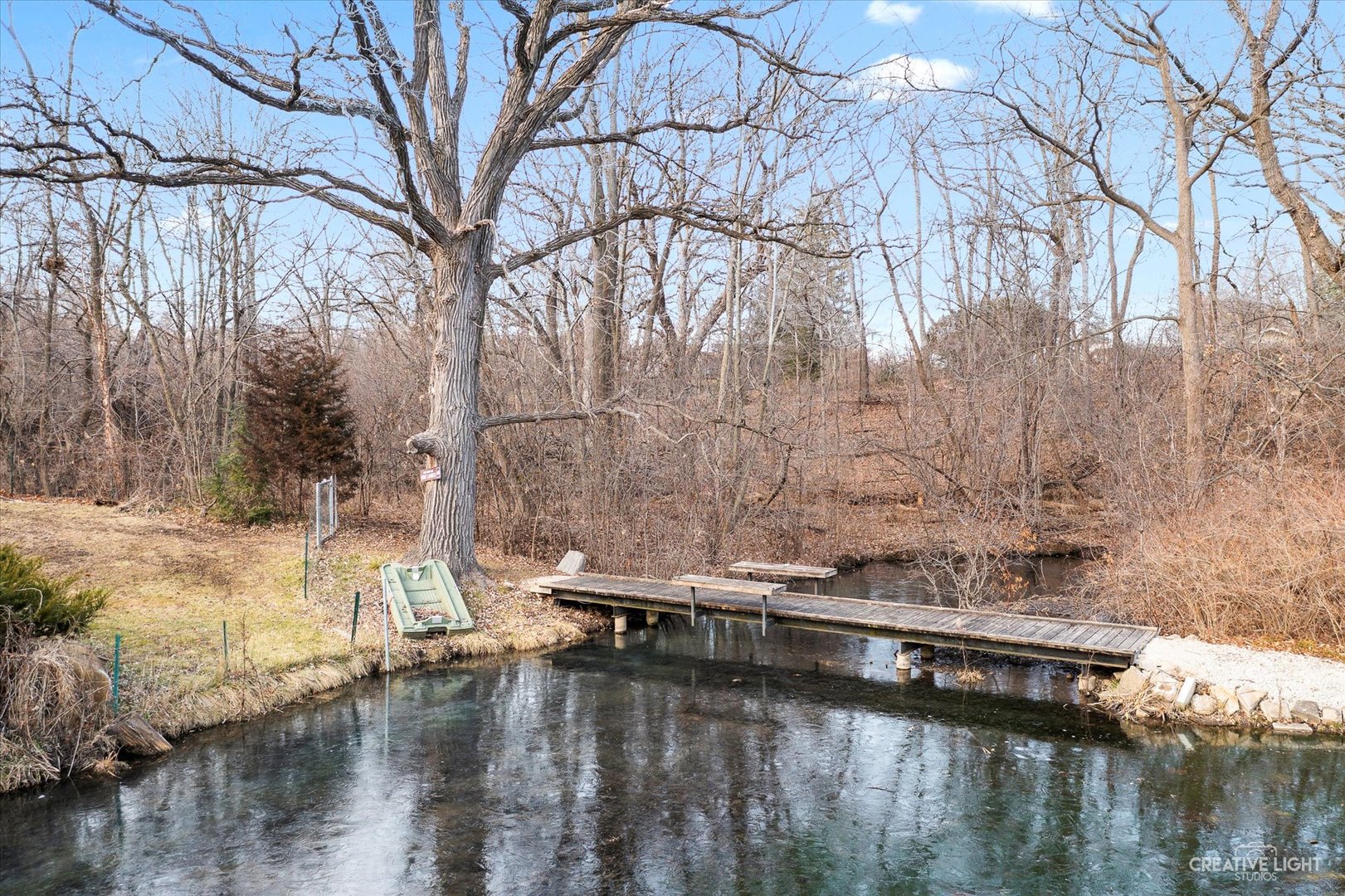 991 Hillcrest Road Elgin, IL 60123 - Photo 31 of 35 a view of a lake with a yard