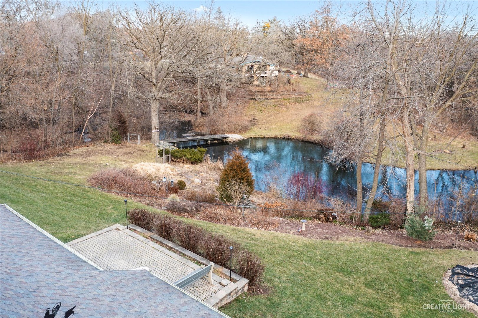 991 Hillcrest Road Elgin, IL 60123 - Photo 32 of 35 a view of a yard with wooden fence