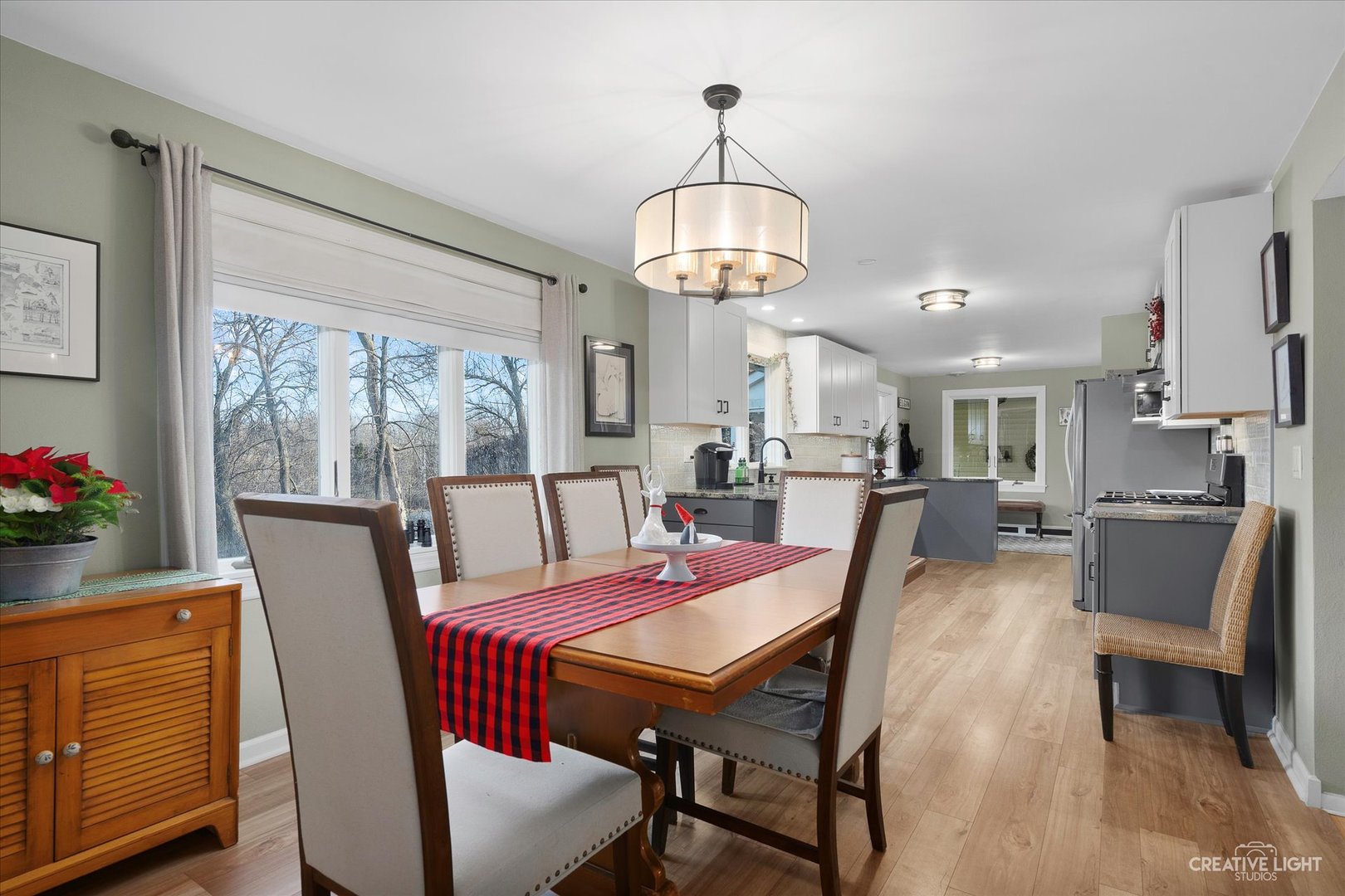991 Hillcrest Road Elgin, IL 60123 - Photo 10 of 35 a view of a dining room with furniture window and outside view