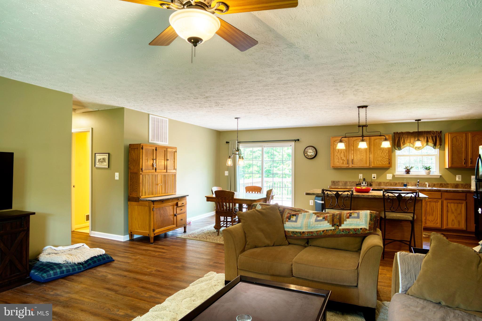 8910 Gunston Road Welcome, MD 20693 - Photo 14 of 31 living/dining/kitchen view