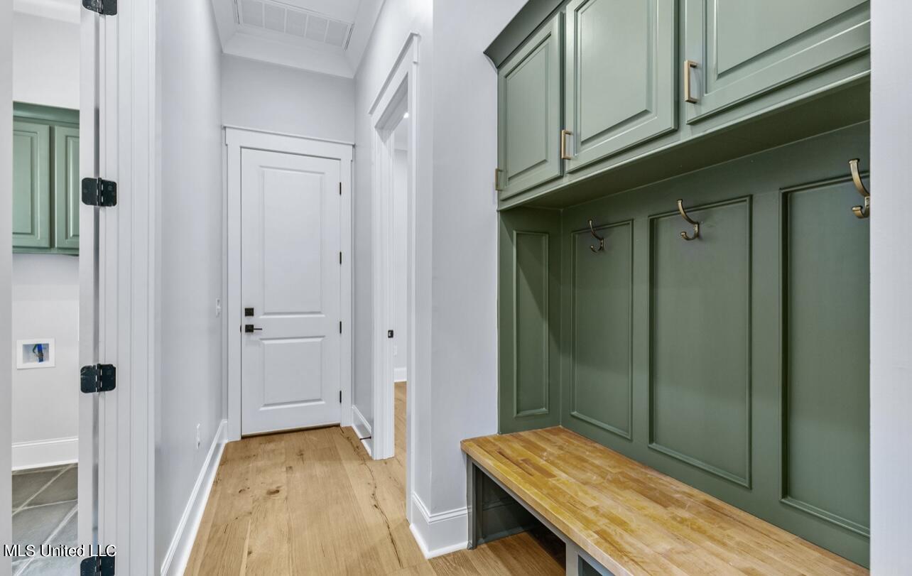 151 Lower Windrush Cove Flowood, MS 39232 - Photo 24 of 58 Garage Foyer with Mudroom area