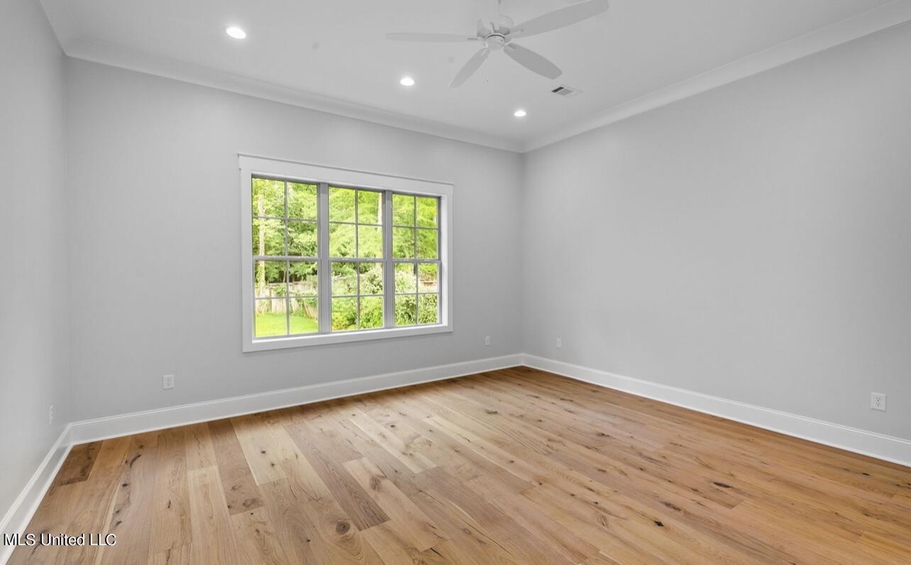 151 Lower Windrush Cove Flowood, MS 39232 - Photo 27 of 58 Main/Primary Bedroom