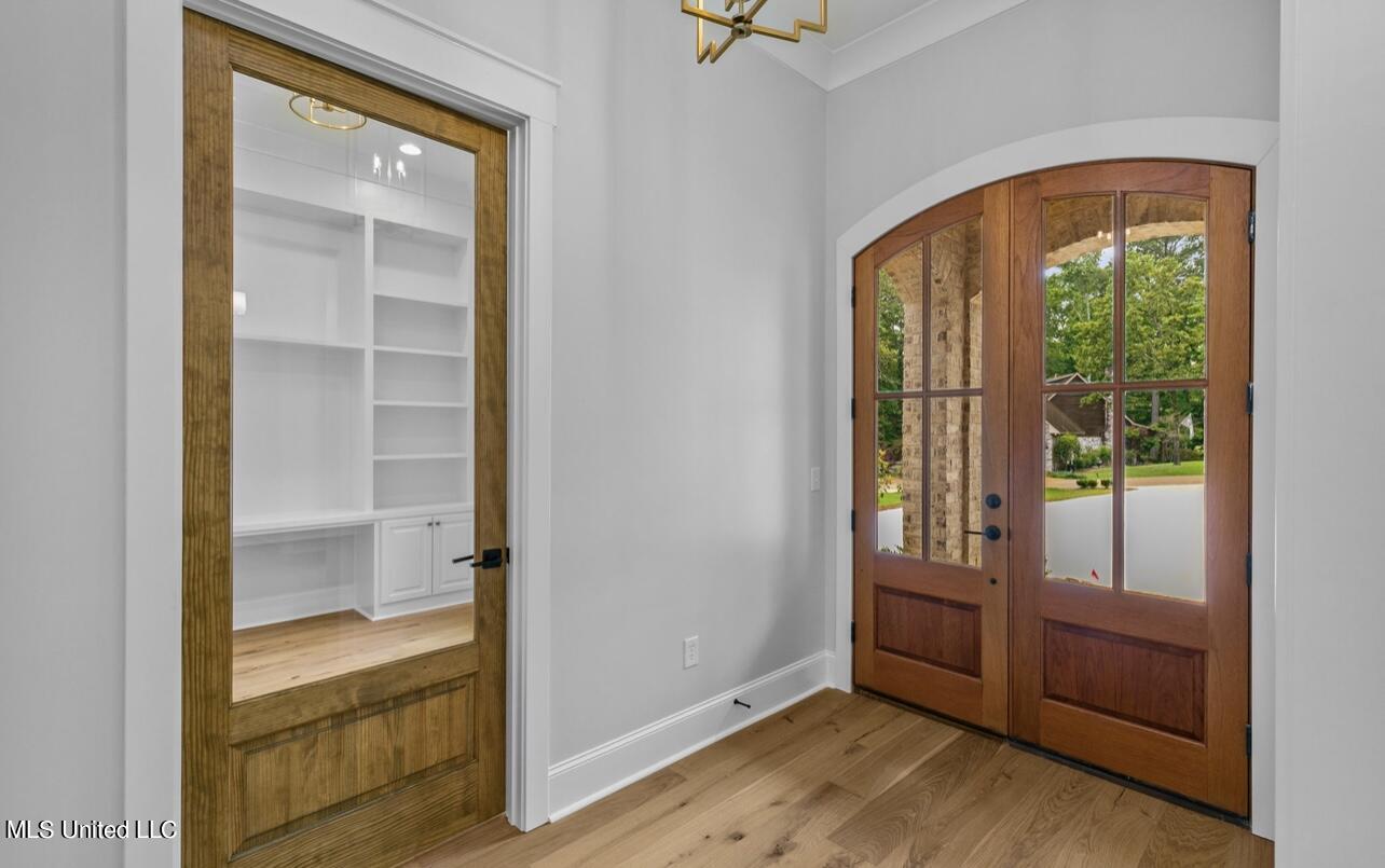 151 Lower Windrush Cove Flowood, MS 39232 - Photo 7 of 58 Foyer and Office Door
