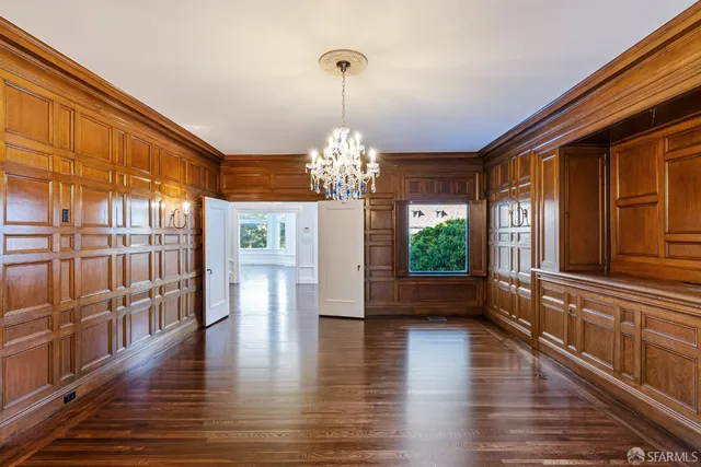 a kitchen with stainless steel appliances a stove a sink and a refrigerator
