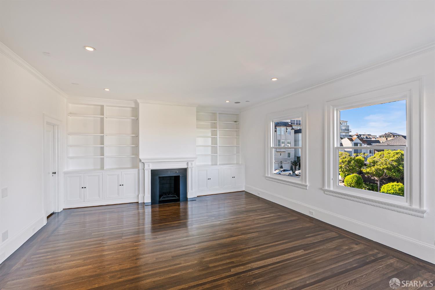 2521 Broadway San Francisco, CA 94115 - Photo 21 of 74 a view of an empty room with wooden floor and a window