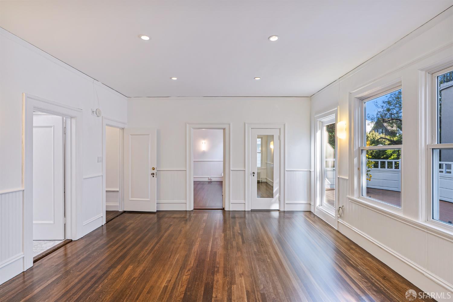 2521 Broadway San Francisco, CA 94115 - Photo 31 of 74 a view of a big room with wooden floor and windows