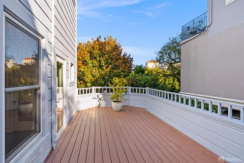 a bathroom with a shower and a sink
