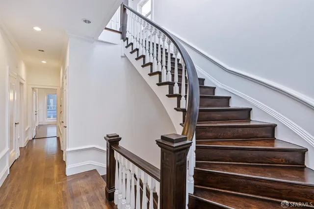 a bathroom with a shower and a sink