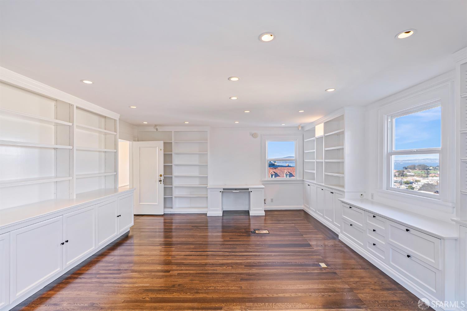 2521 Broadway San Francisco, CA 94115 - Photo 36 of 74 a view of empty room with wooden floor and fan