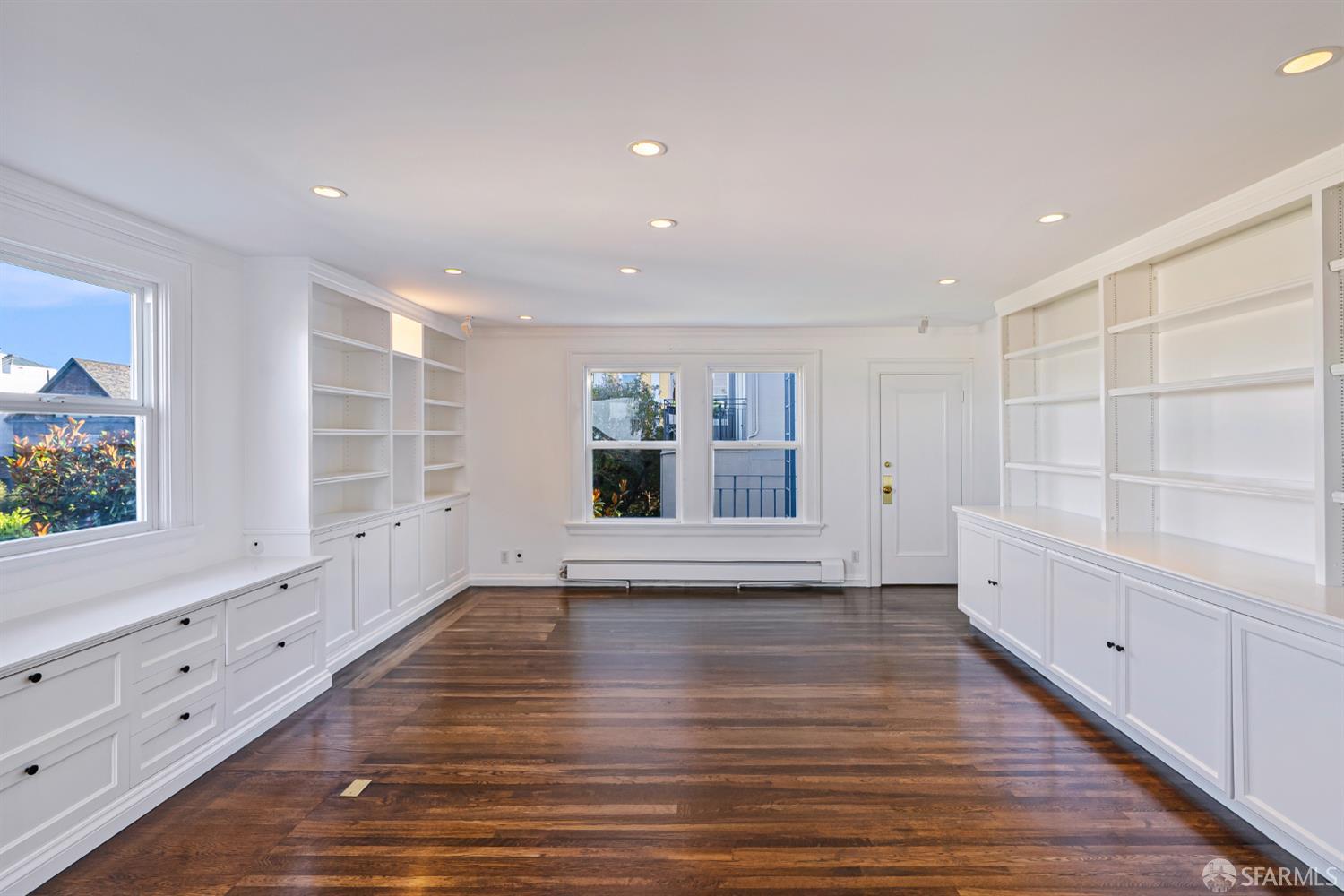 2521 Broadway San Francisco, CA 94115 - Photo 37 of 74 a view of empty room with wooden floor and fan