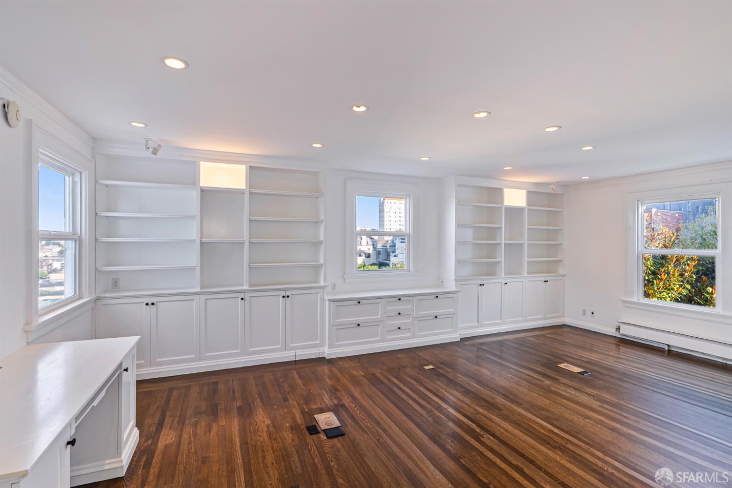 2521 Broadway San Francisco, CA 94115 - Photo 38 of 74 a view of a room with wooden floors and cabinet