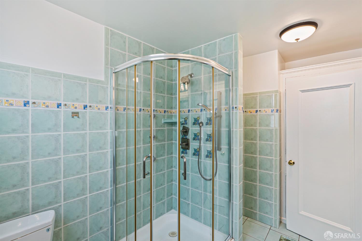 2521 Broadway San Francisco, CA 94115 - Photo 48 of 74 a bathroom with a shower and a sink