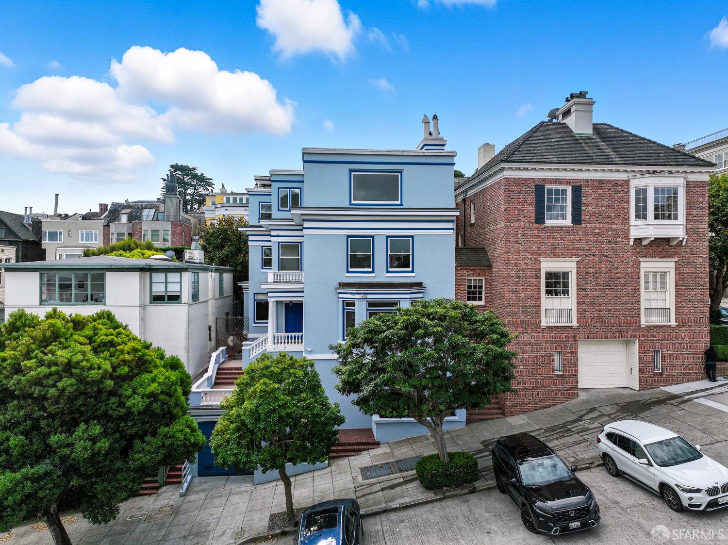 2521 Broadway San Francisco, CA 94115 - Photo 5 of 74 a front view of a house with yard and parking
