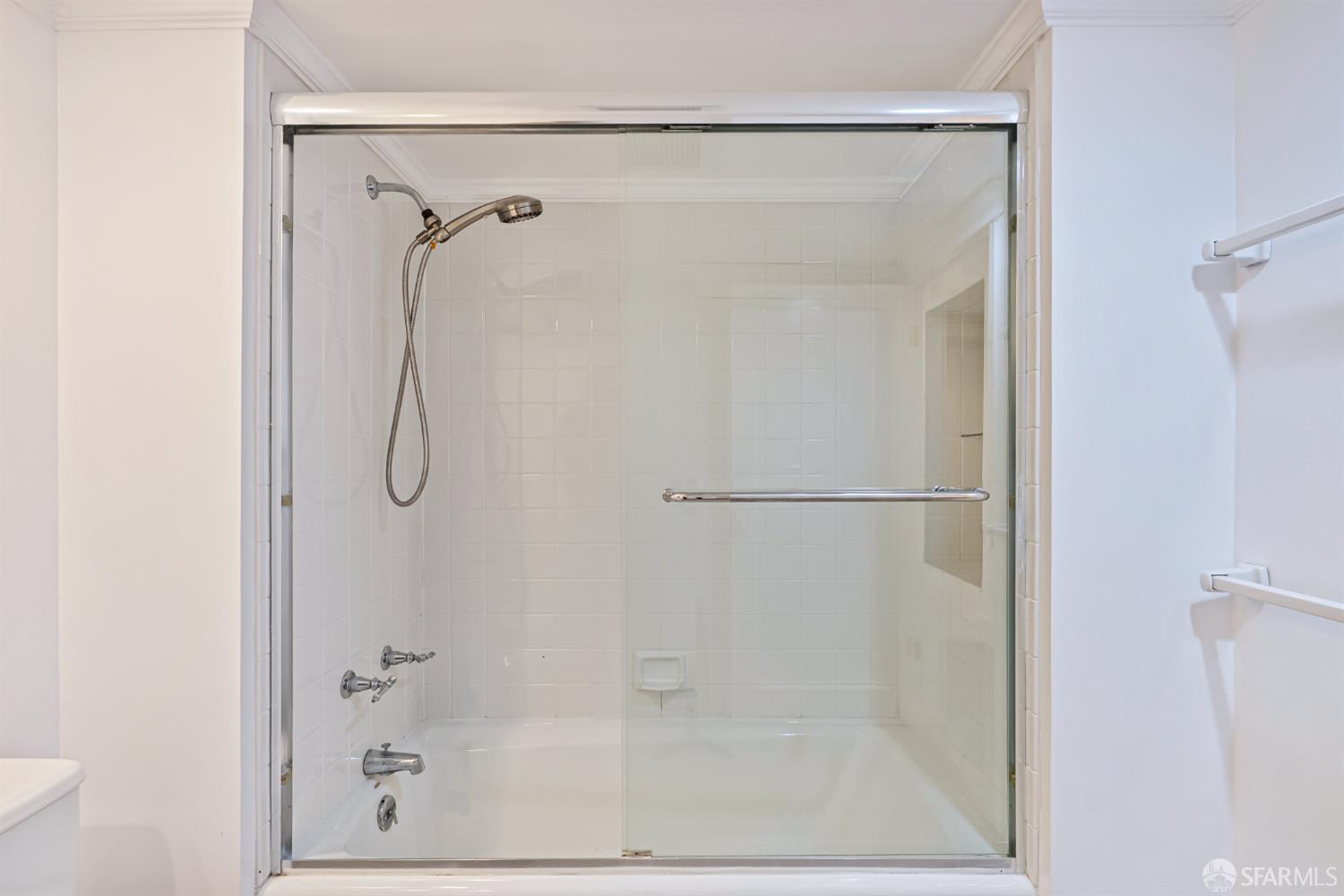 2521 Broadway San Francisco, CA 94115 - Photo 52 of 74 a bathroom with a glass shower door