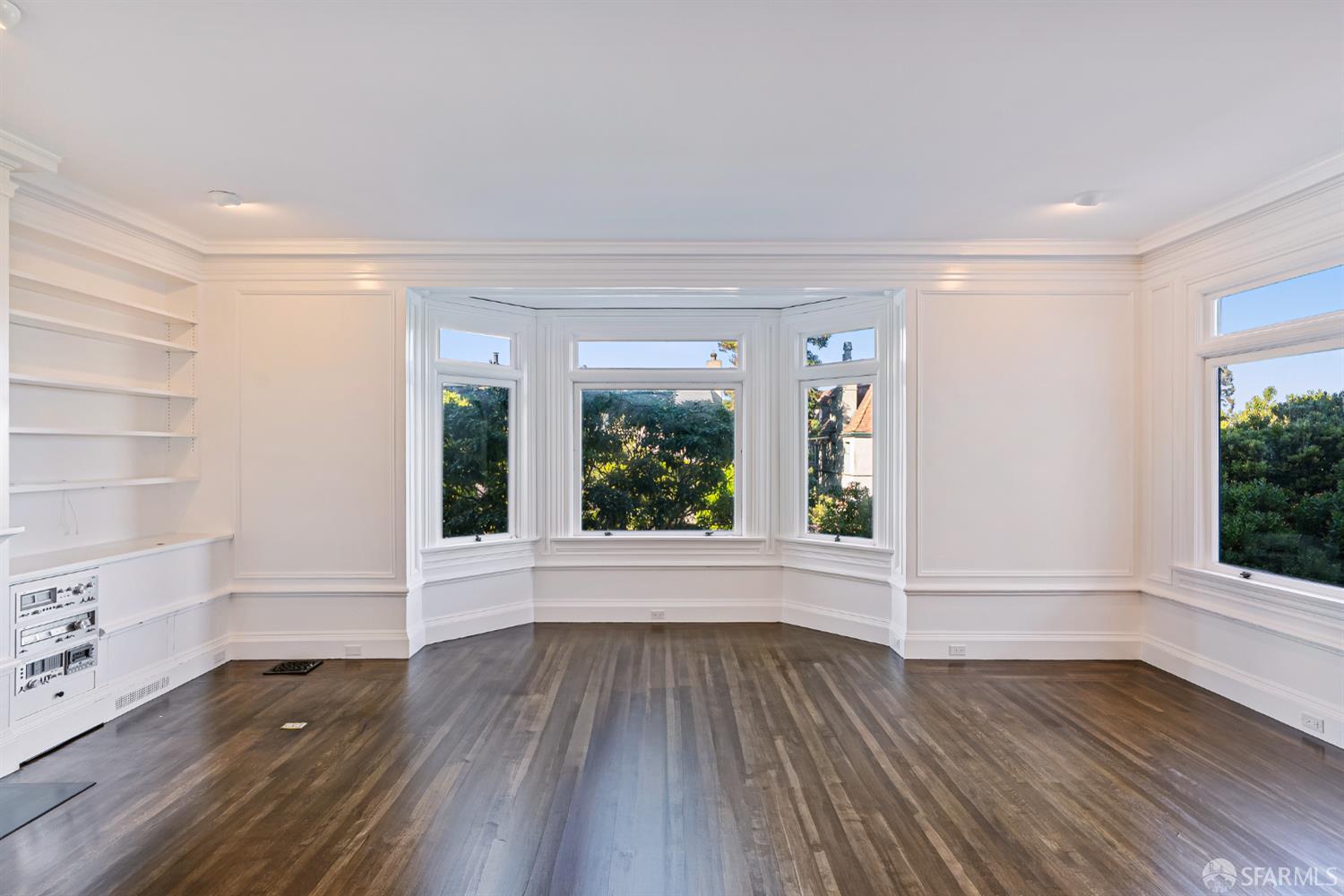 2521 Broadway San Francisco, CA 94115 - Photo 9 of 74 wooden floor in an empty room with a window