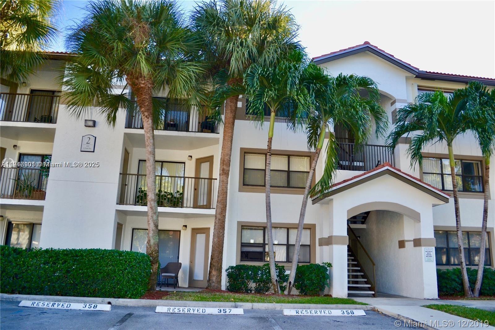 620 South Park Road, Unit 272 Hollywood, FL 33021 - Photo 3 of 23 a front view of a house with plants and entryway