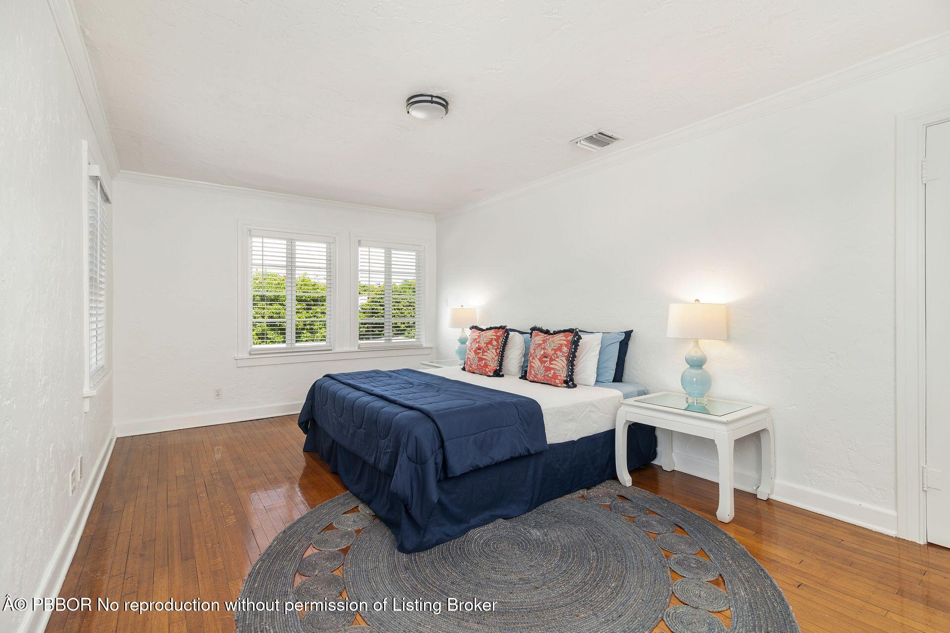 3020 Vincent Road West Palm Beach, FL 33405 - Photo 15 of 56 a living room with a bed furniture and a window