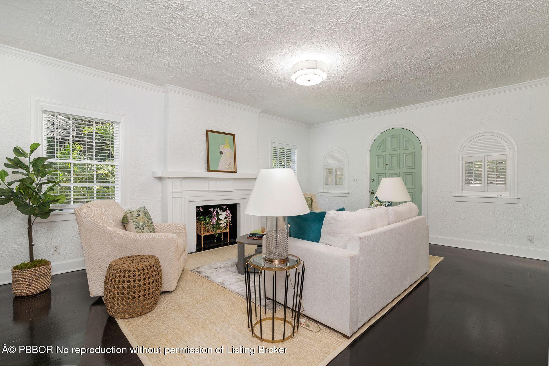 3020 Vincent Road West Palm Beach, FL 33405 - Photo 2 of 56 a living room with furniture and a window