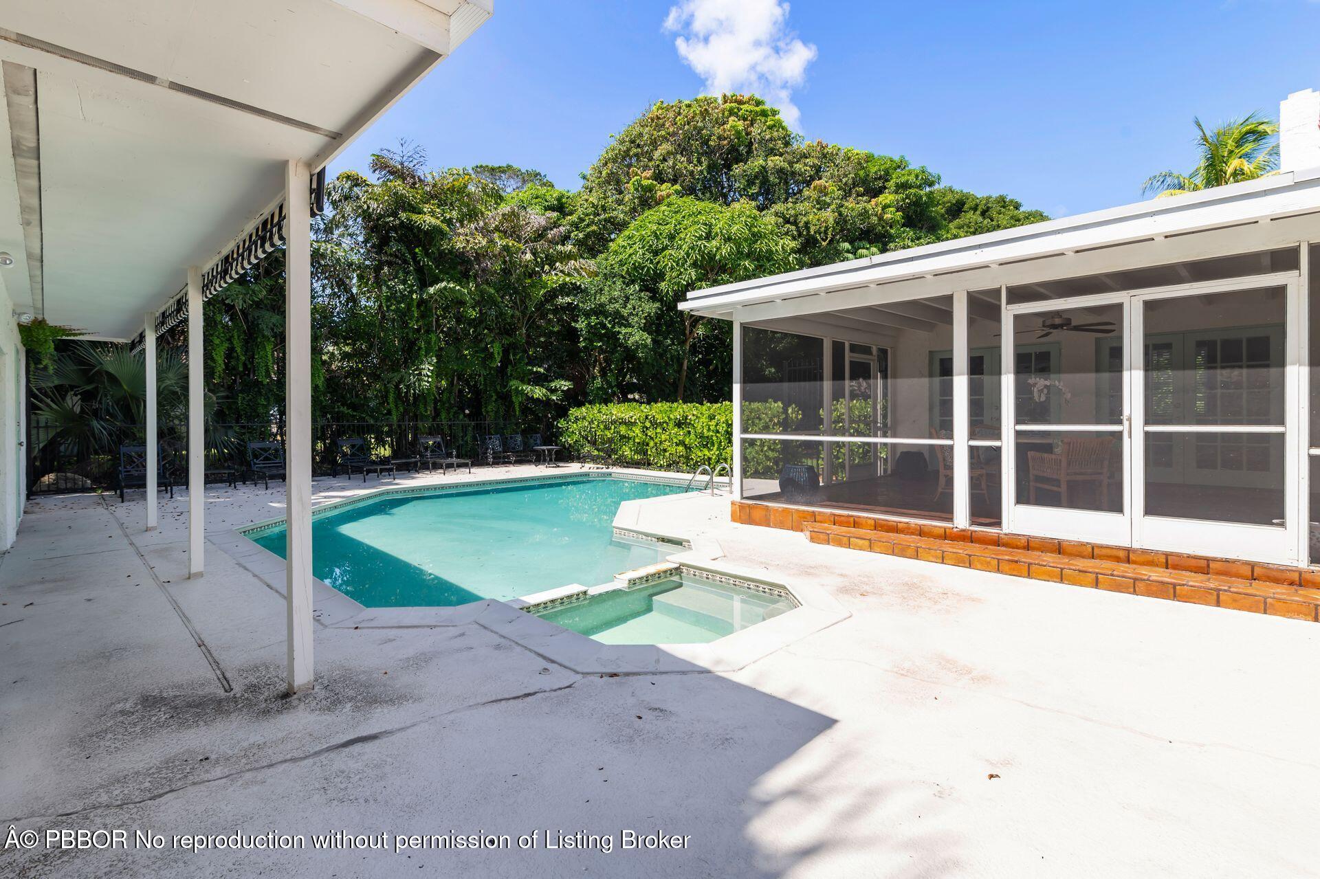 3020 Vincent Road West Palm Beach, FL 33405 - Photo 37 of 56 a view of a house with a yard and sitting area
