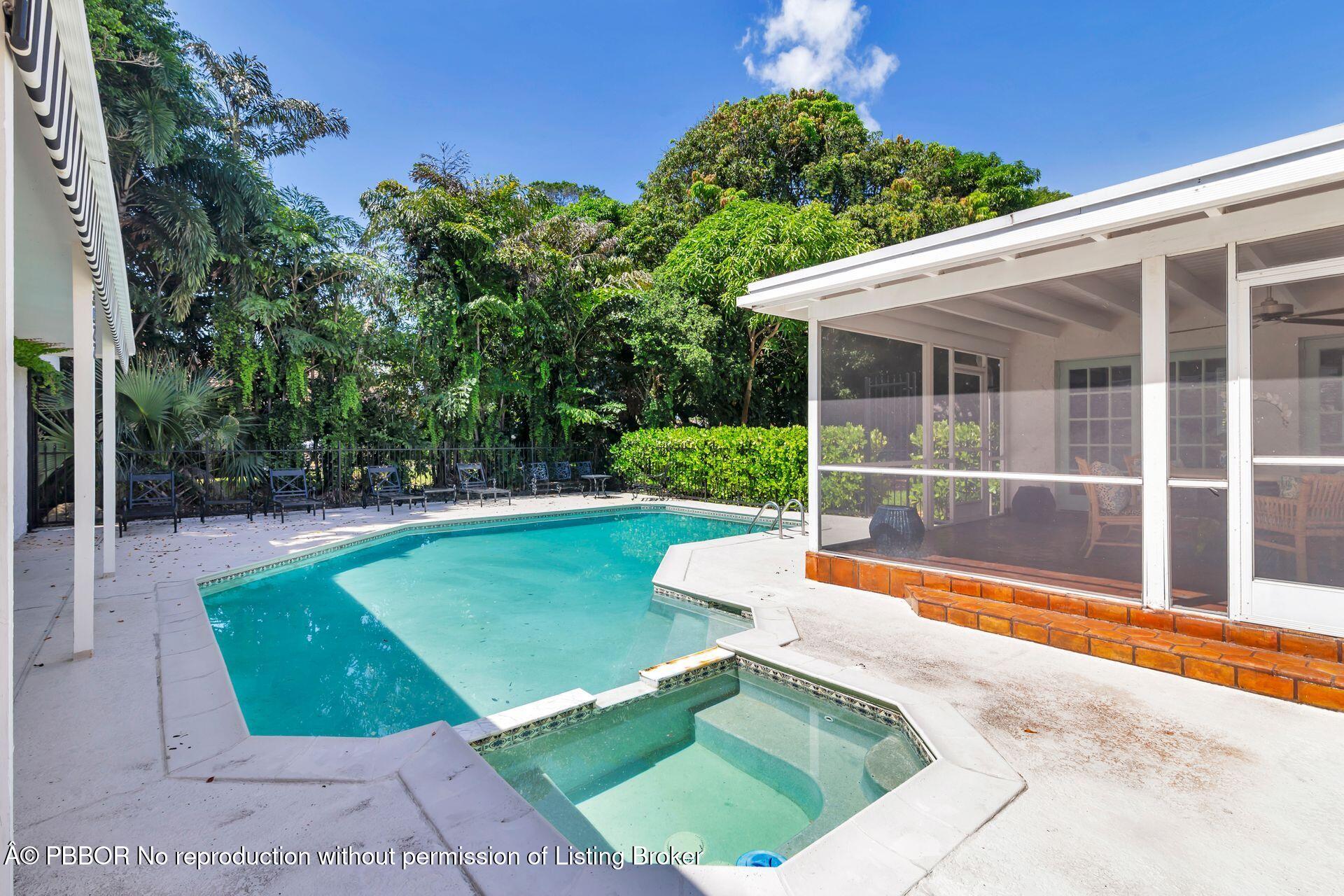 3020 Vincent Road West Palm Beach, FL 33405 - Photo 38 of 56 a view of a backyard with a swimming pool