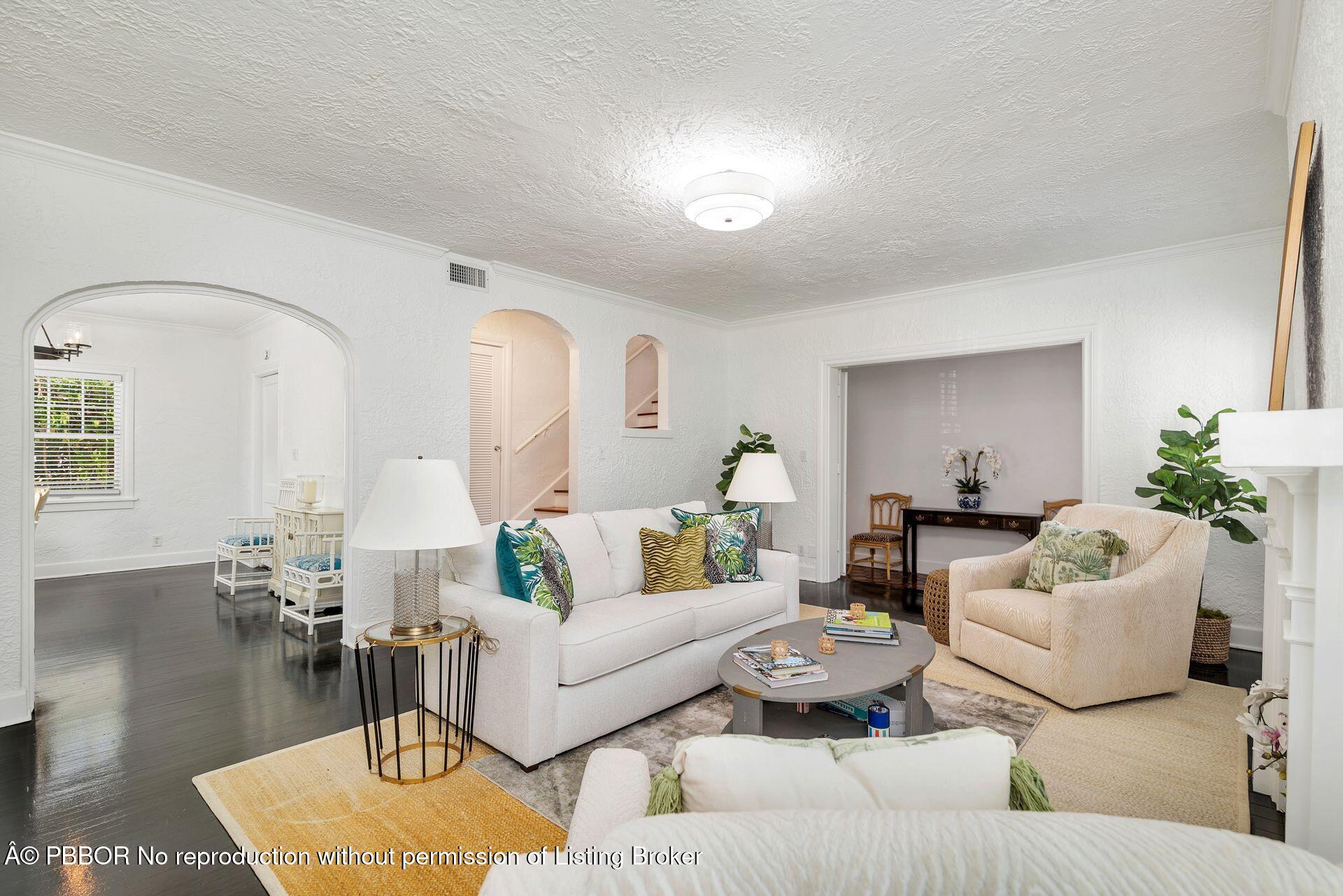 3020 Vincent Road West Palm Beach, FL 33405 - Photo 4 of 56 a living room with furniture and wooden floor