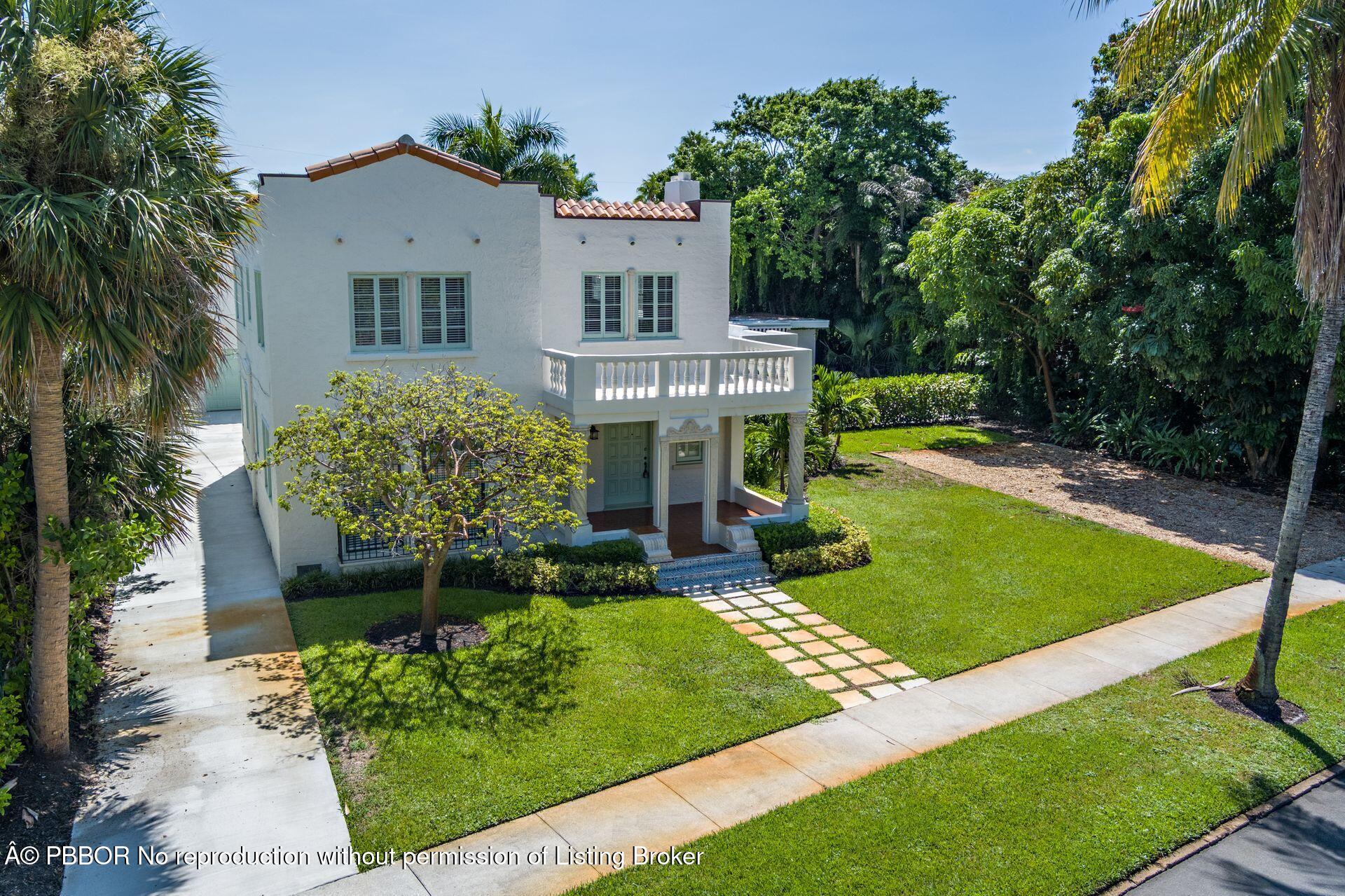 3020 Vincent Road West Palm Beach, FL 33405 - Photo 43 of 56 a front view of a house with garden