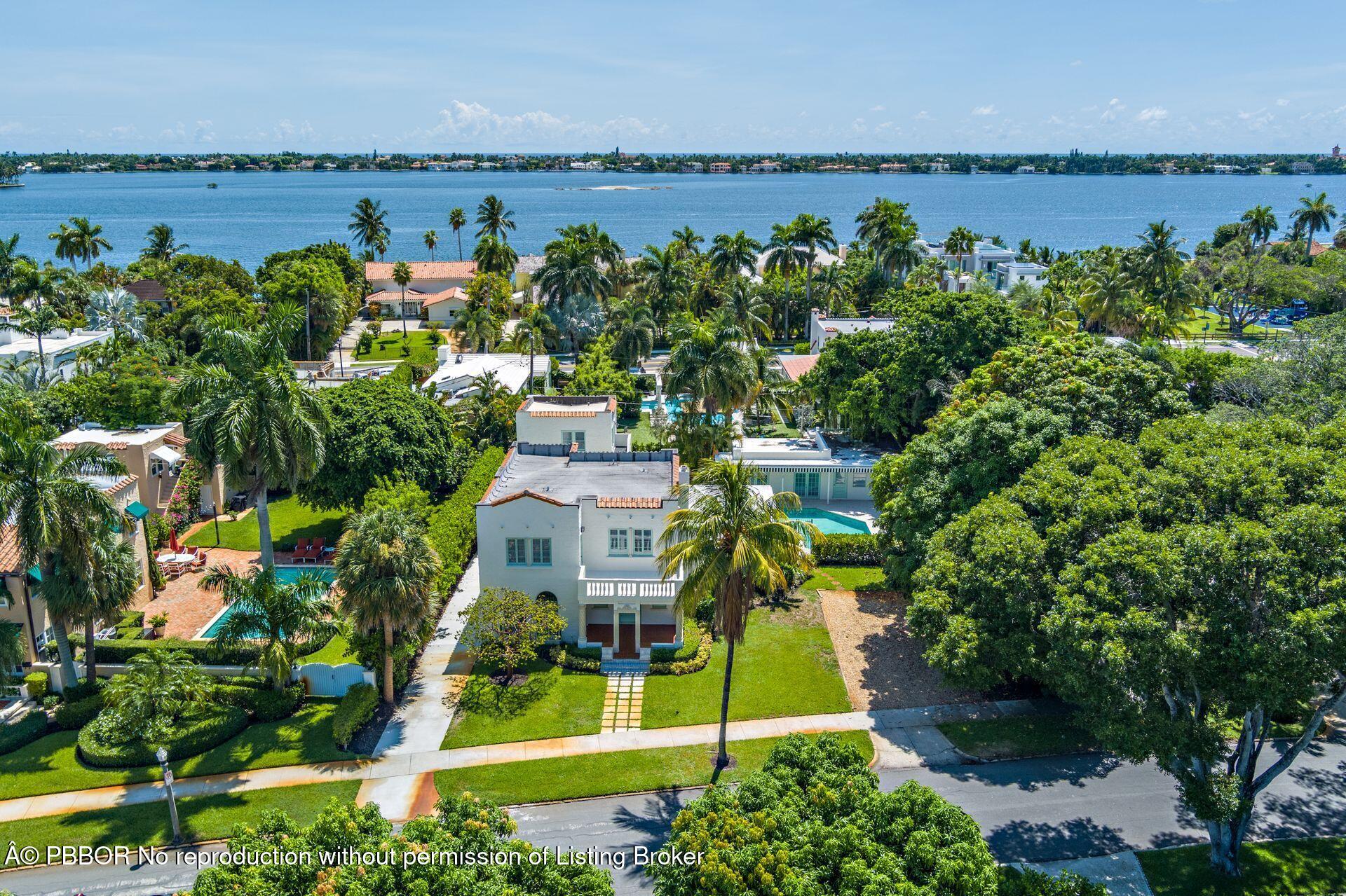 3020 Vincent Road West Palm Beach, FL 33405 - Photo 45 of 56 an aerial view of a house with a garden and lake view