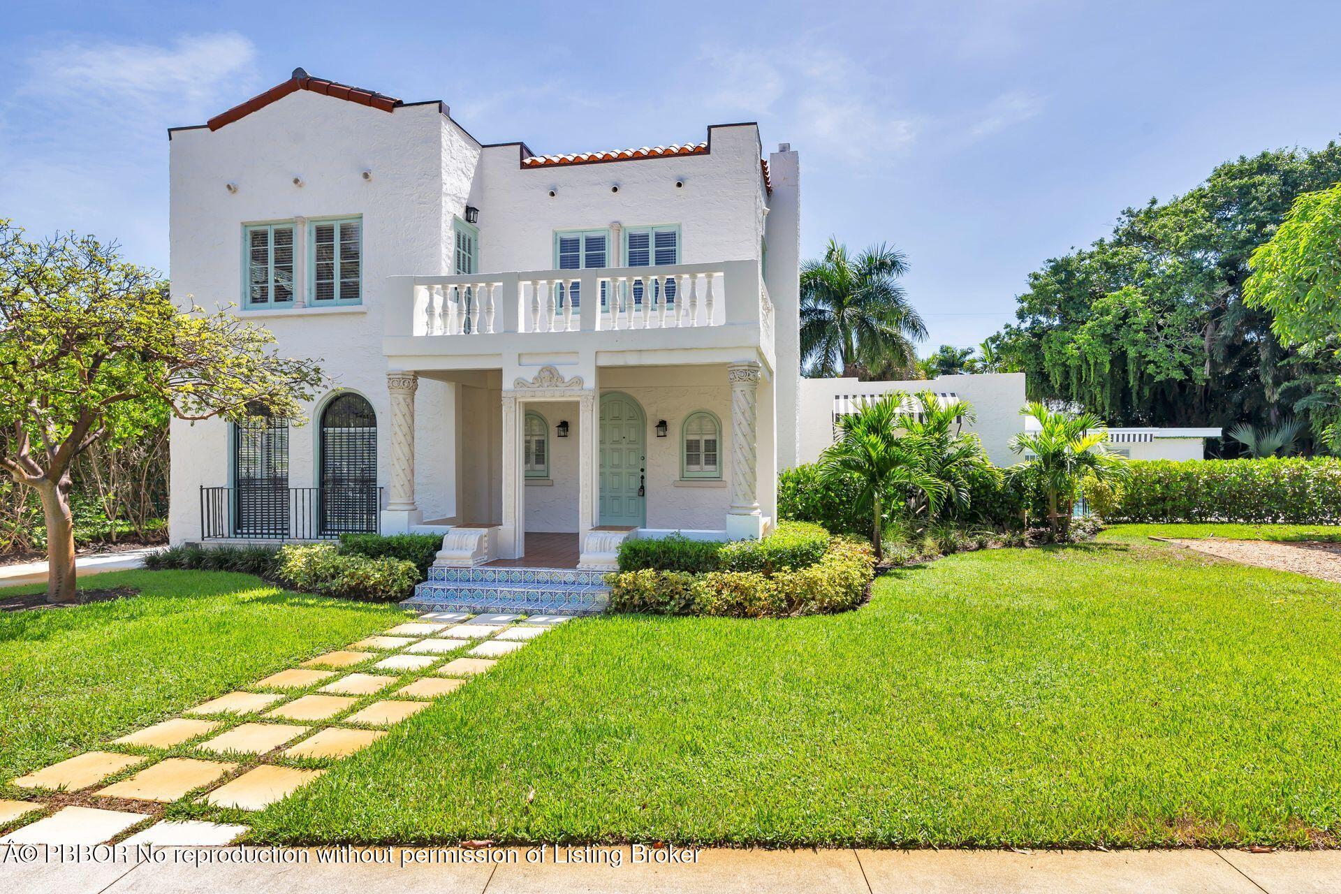 3020 Vincent Road West Palm Beach, FL 33405 - Photo 56 of 56 a front view of a house with garden and porch