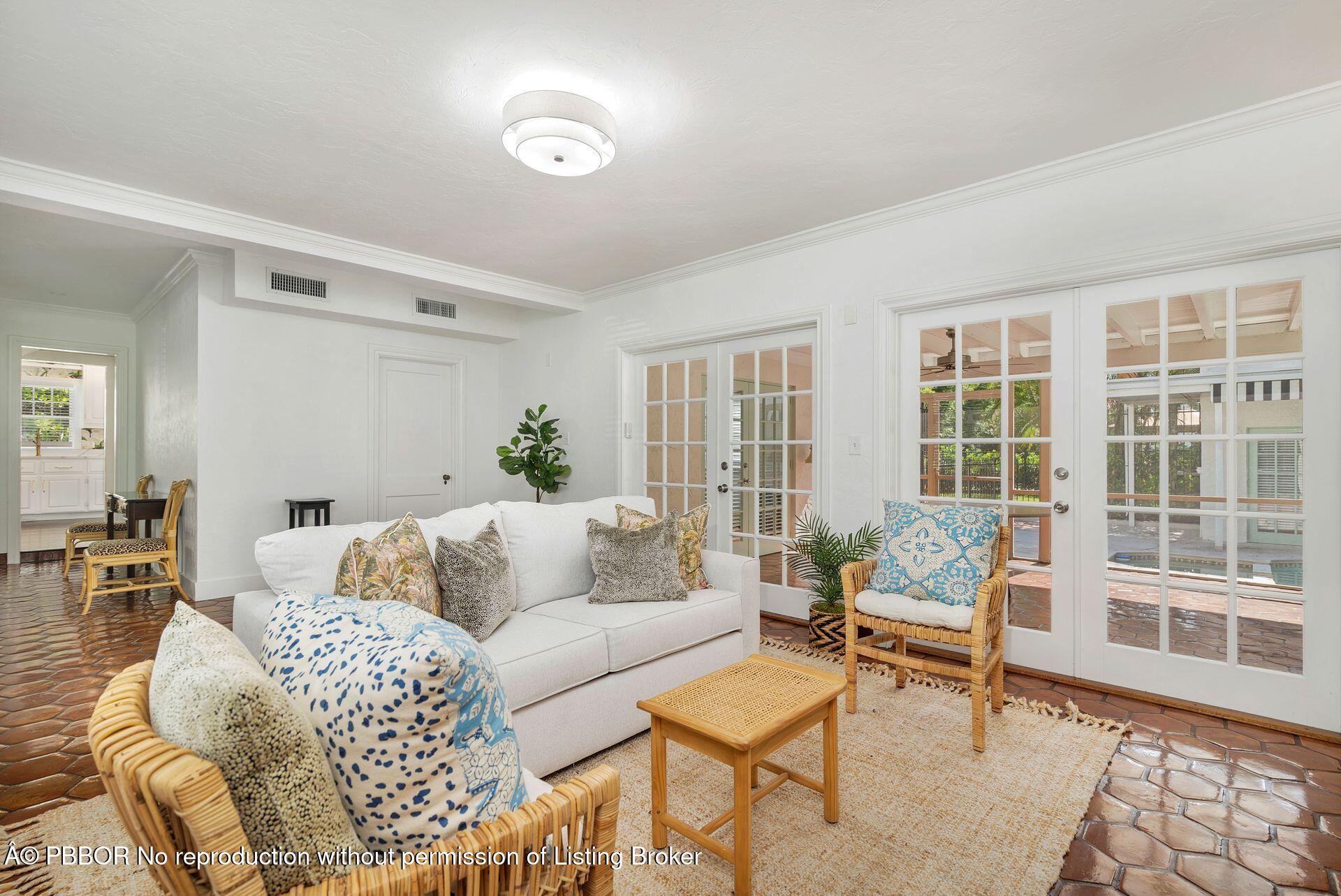 3020 Vincent Road West Palm Beach, FL 33405 - Photo 7 of 56 a living room with furniture and a window