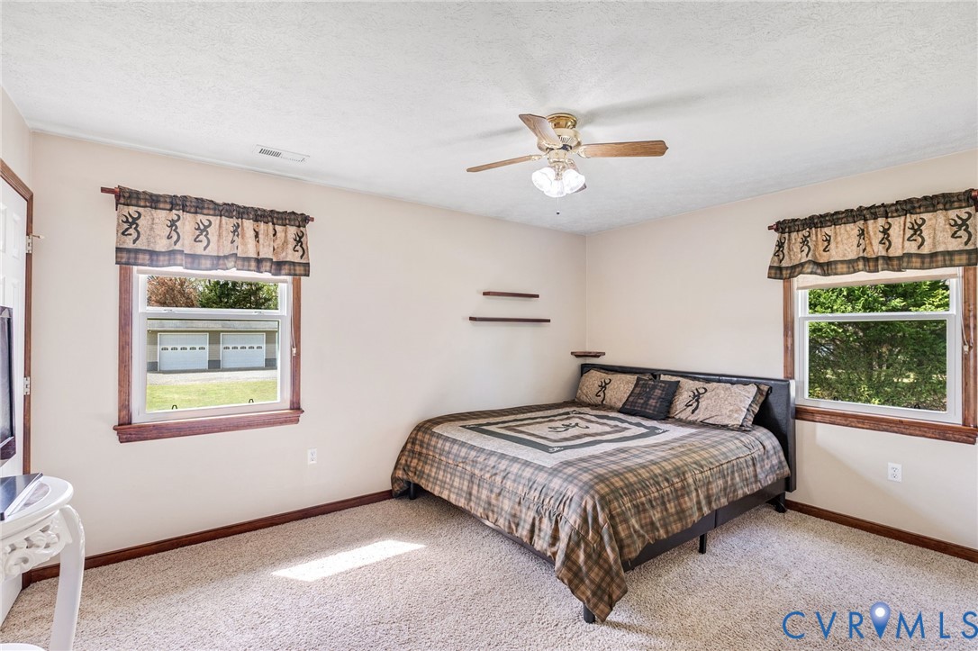 3411 Spring Run Road Mechanicsville, VA 23111 - Photo 12 of 41 a bedroom with a bed and a window