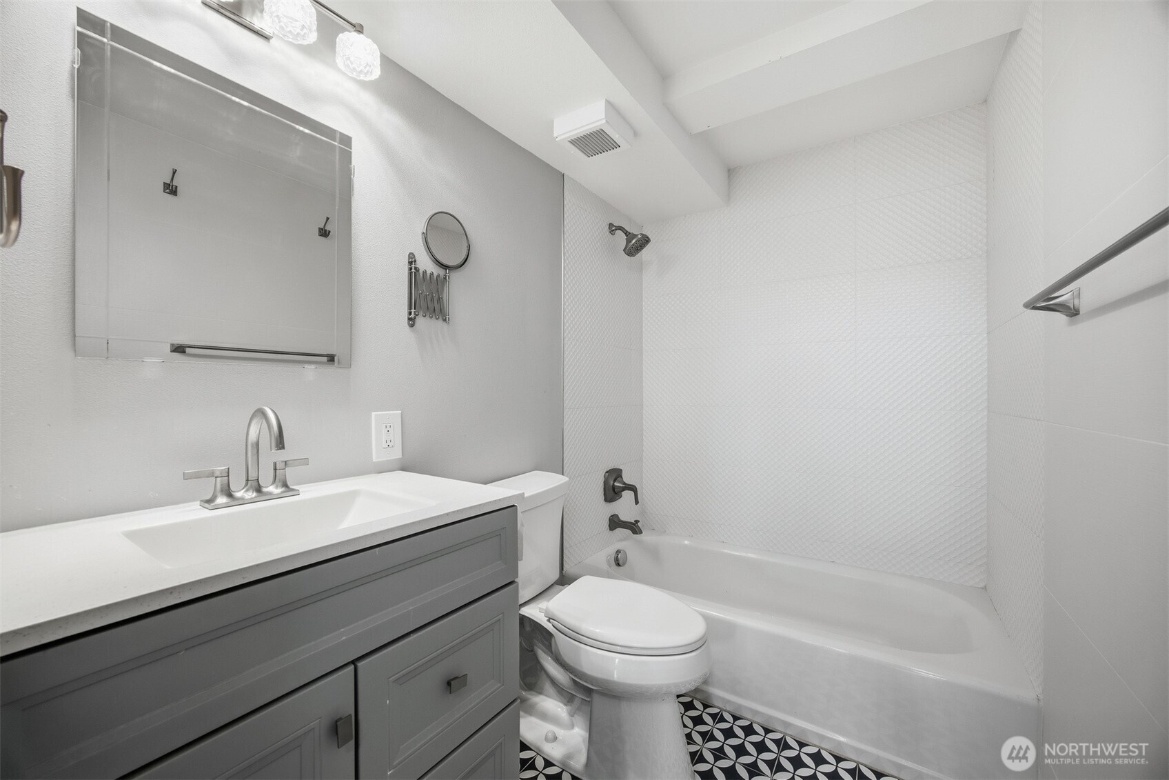 1201 11th Street, Unit 303 Bellingham, WA 98225 - Photo 14 of 34 a bathroom with a sink a toilet and shower