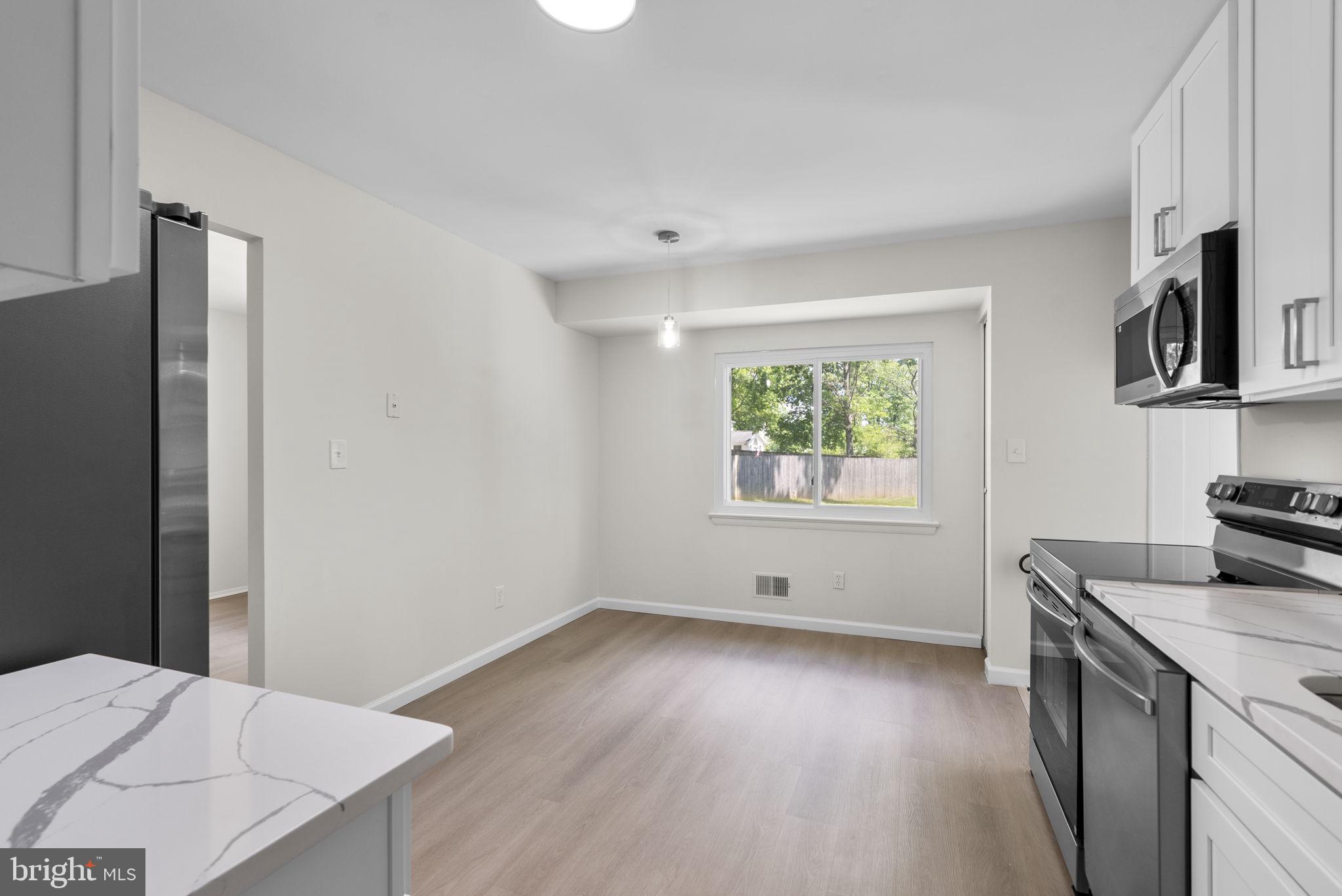 17109 Oxley Farm Road Poolesville, MD 20837 - Photo 14 of 43 Table space kitchen