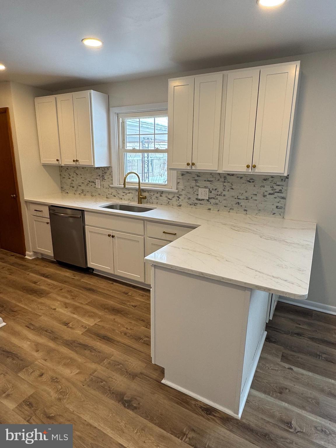 3510 Carlisle Road Dover, PA 17315 - Photo 3 of 32 a kitchen with a sink cabinets and wooden floor