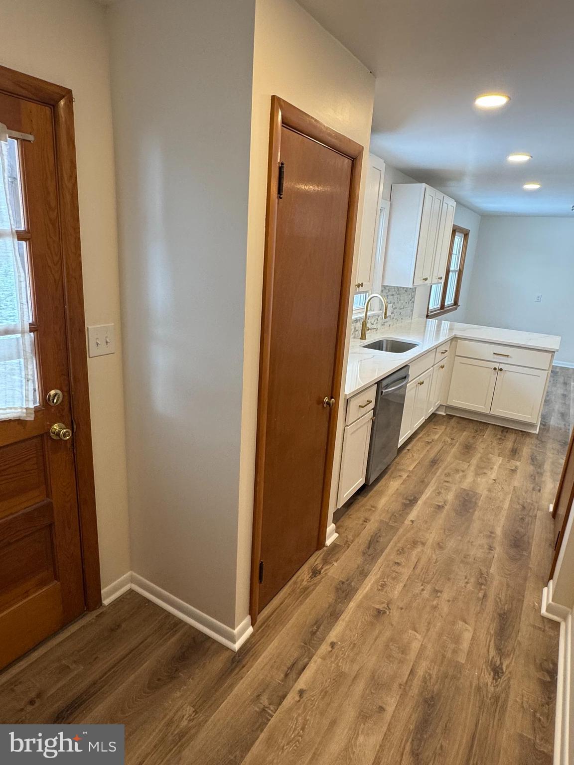 3510 Carlisle Road Dover, PA 17315 - Photo 6 of 32 a view of a kitchen with wooden floor and electronic appliances