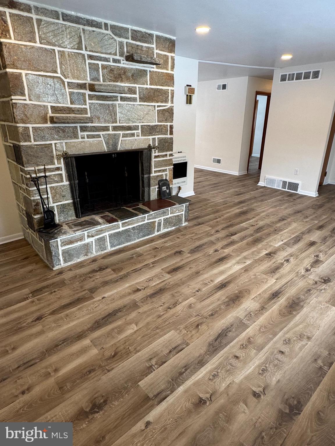 3510 Carlisle Road Dover, PA 17315 - Photo 7 of 32 a living room with a fireplace