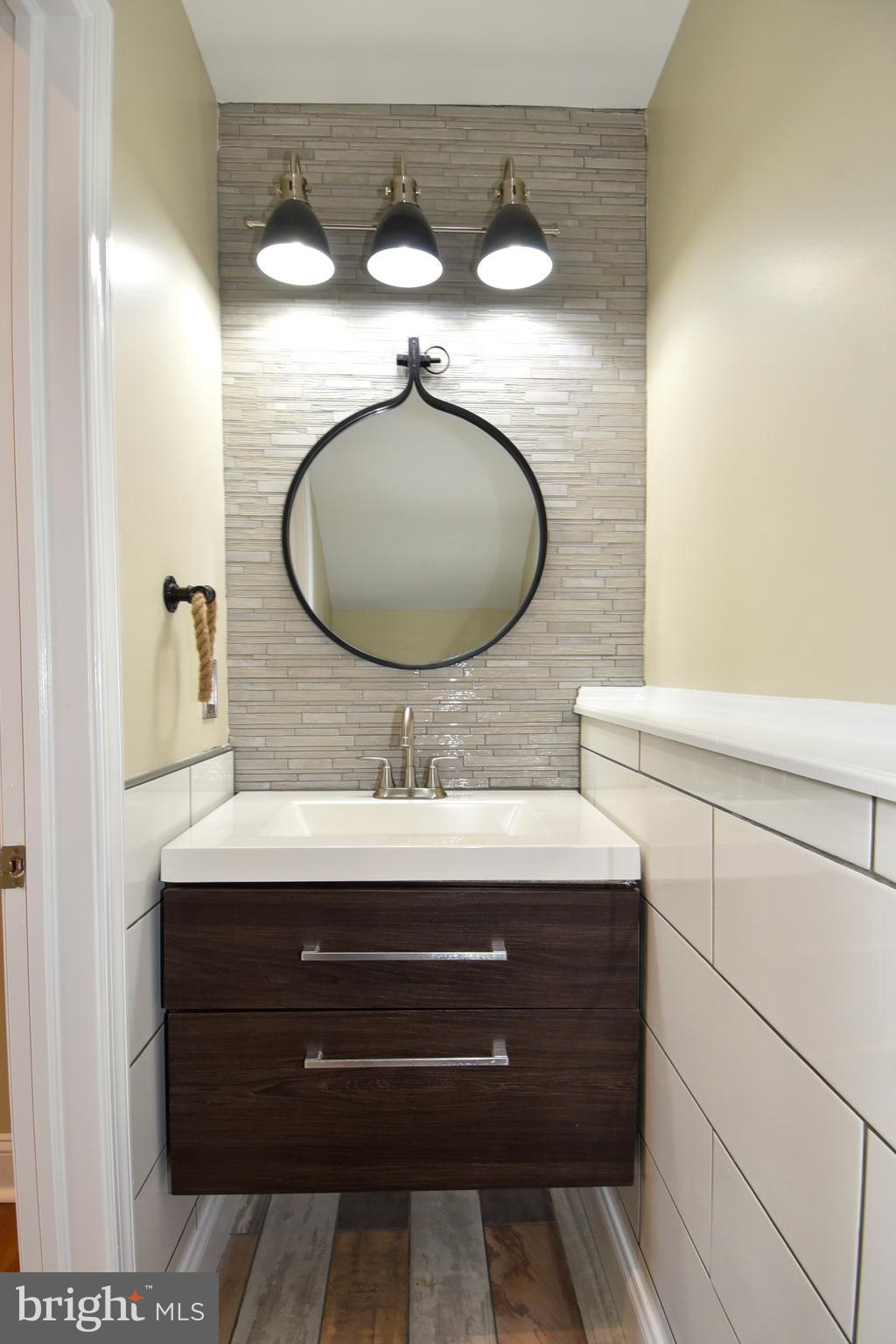 1805 Glenarm Road Edgewater, MD 21037 - Photo 29 of 59 LOWER LEVEL POWDER ROOM