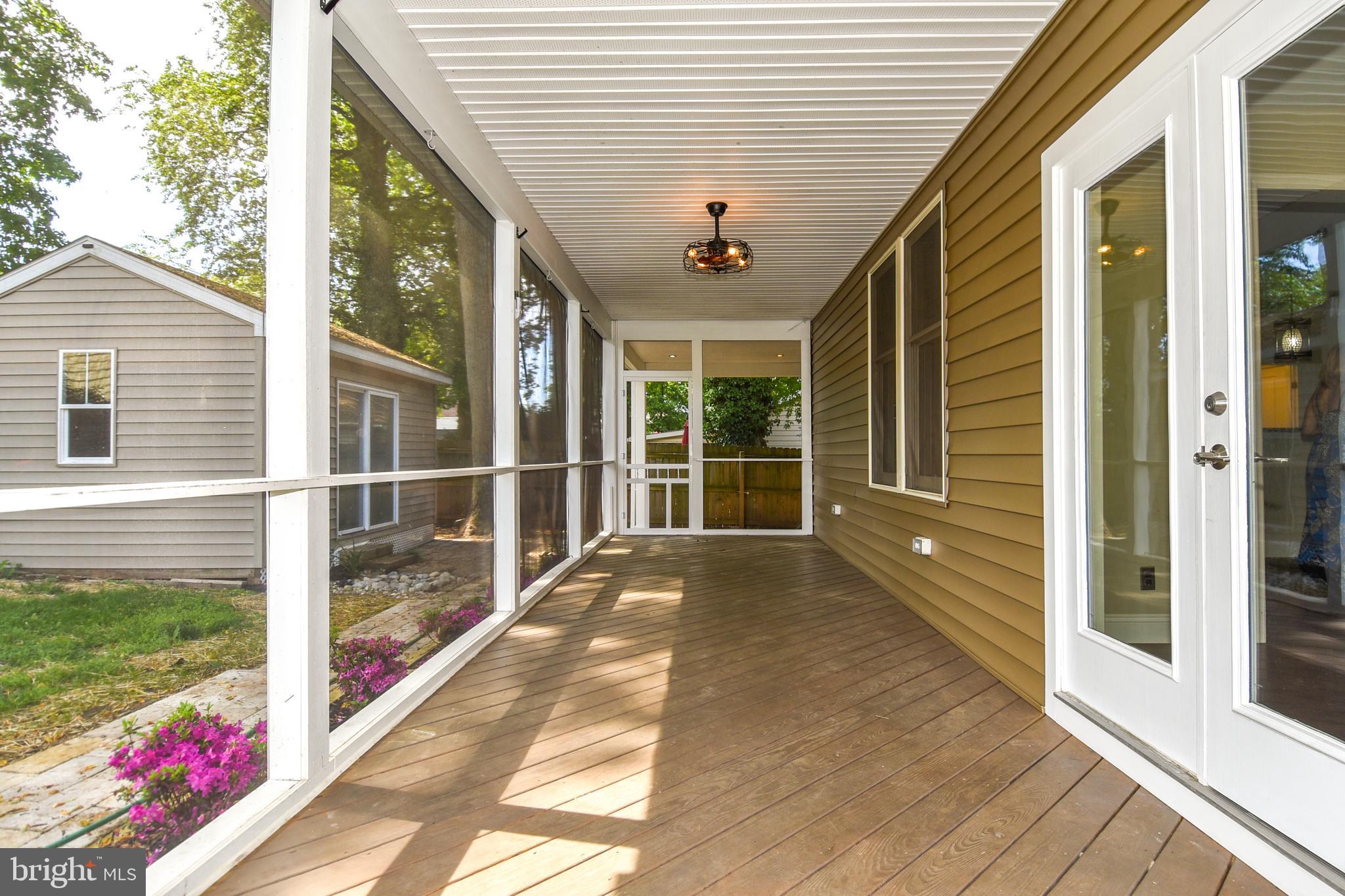 1805 Glenarm Road Edgewater, MD 21037 - Photo 45 of 59 EXTERIOR REAR PORCH DOOR ACCESS TO DINING ROOM